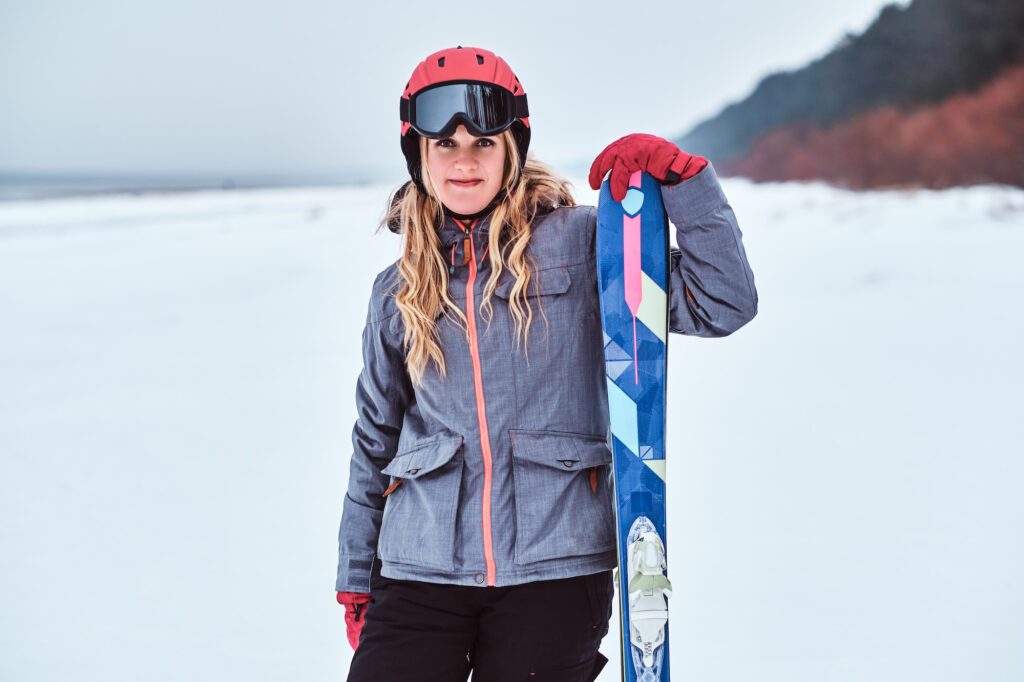 norwegian woman wearing ski suit and posing